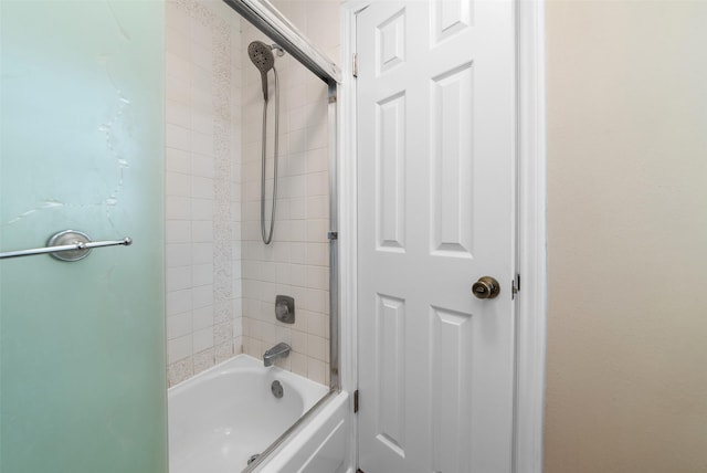 full bathroom featuring combined bath / shower with glass door