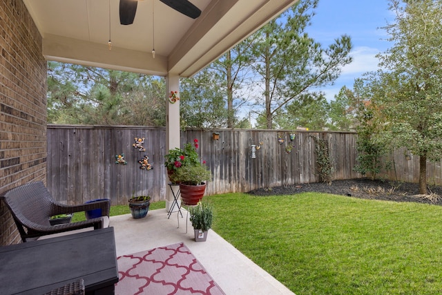 view of patio with ceiling fan and a fenced backyard