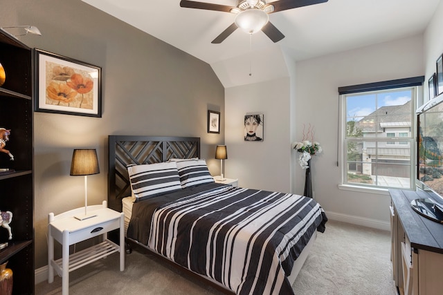 bedroom with lofted ceiling, carpet floors, ceiling fan, and baseboards