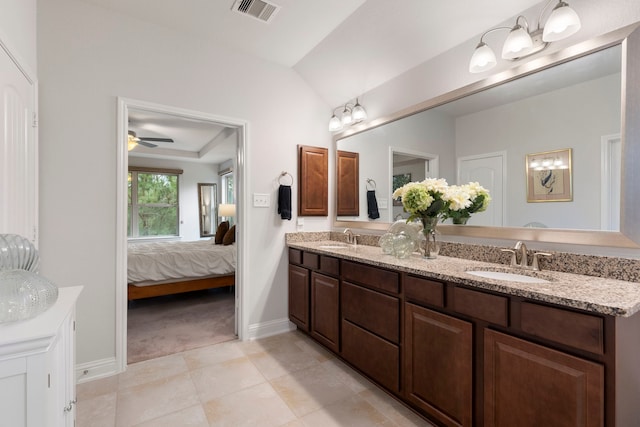 full bath with double vanity, visible vents, a sink, and ensuite bathroom