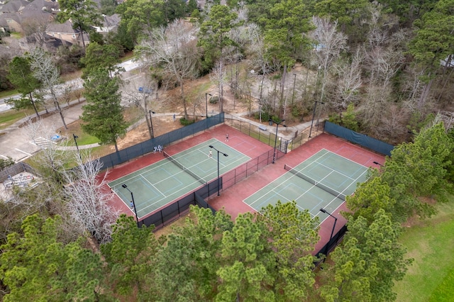 view of tennis court with fence