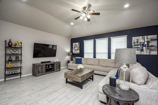 living room with recessed lighting, a ceiling fan, baseboards, vaulted ceiling, and light wood-style floors