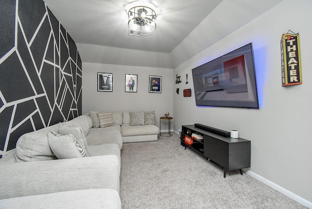 carpeted living room with baseboards