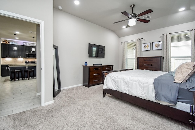 bedroom featuring light carpet, baseboards, visible vents, vaulted ceiling, and recessed lighting