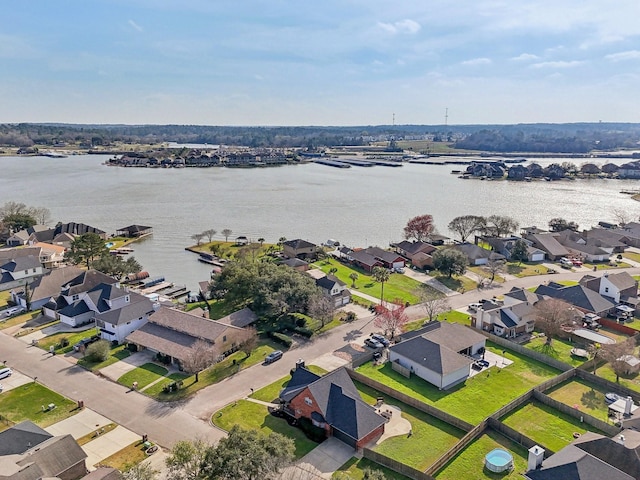 aerial view featuring a water view and a residential view