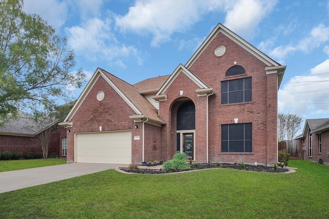 traditional-style house with a garage, concrete driveway, a front lawn, and brick siding