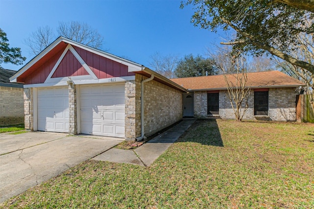 ranch-style home featuring a front lawn, a garage, and brick siding