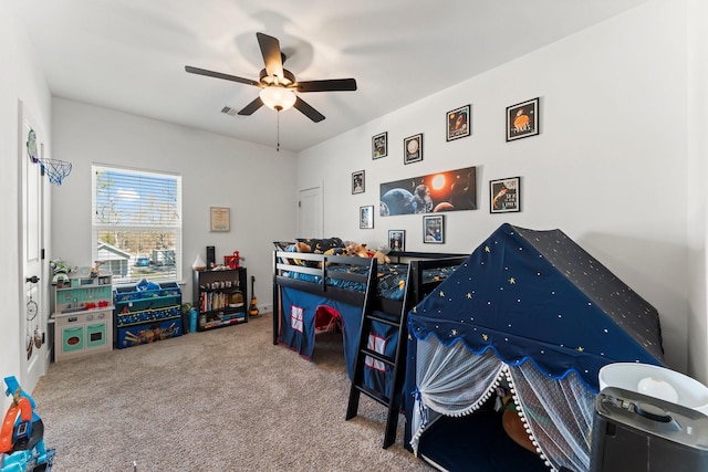 carpeted bedroom featuring ceiling fan