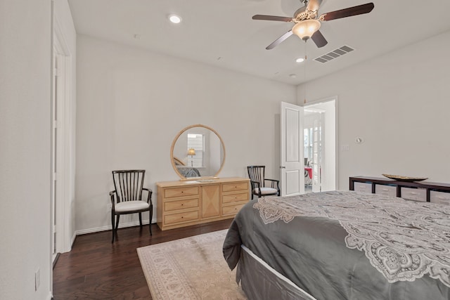 bedroom with baseboards, visible vents, ceiling fan, dark wood-type flooring, and recessed lighting