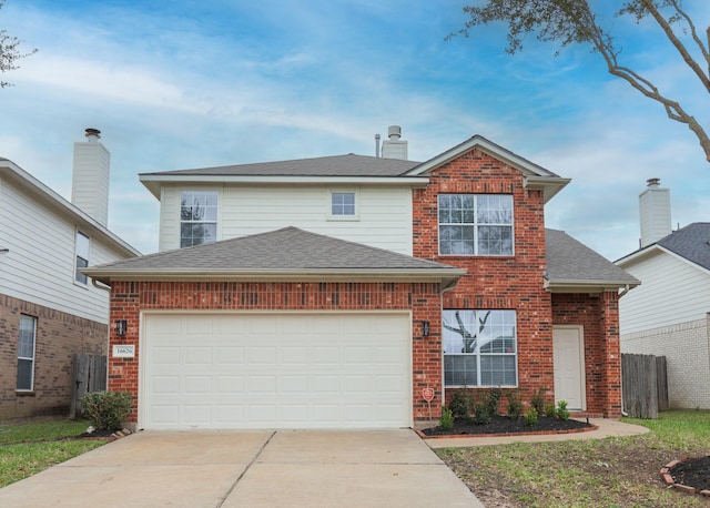 traditional home featuring a garage, concrete driveway, brick siding, and a shingled roof