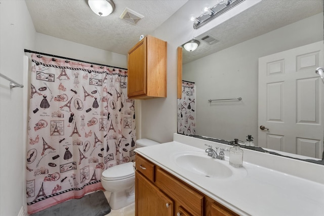 5811 Tremont Dr, Cove, TX 77523 - bathroom with toilet, vanity, a textured ceiling, and a shower with curtain