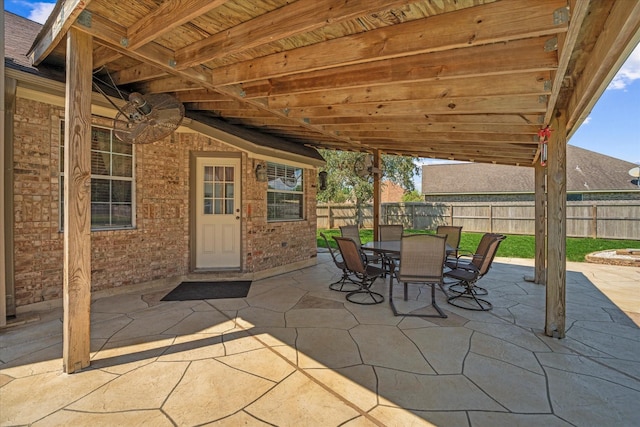 5811 Tremont Dr, Cove, TX 77523 - fenced backyard featuring a patio area and outdoor dining space