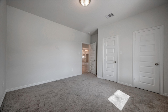 24690 Galway St, Hempstead, TX 77445 - unfurnished bedroom featuring light carpet, visible vents, and baseboards