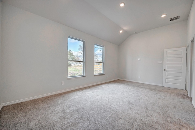 24690 Galway St, Hempstead, TX 77445 - empty room featuring recessed lighting, light carpet, visible vents, baseboards, and vaulted ceiling