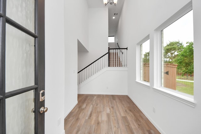 24727 Harrow Meadow Dr, Katy, TX 77493 - foyer entrance featuring baseboards, recessed lighting, wood finished floors, and stairs