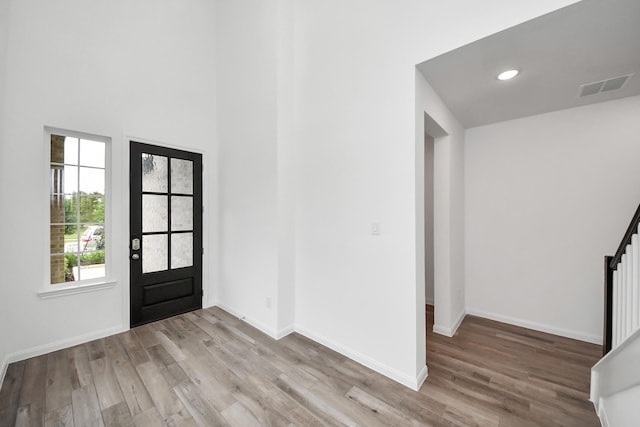 24727 Harrow Meadow Dr, Katy, TX 77493 - foyer entrance with visible vents, baseboards, and wood finished floors