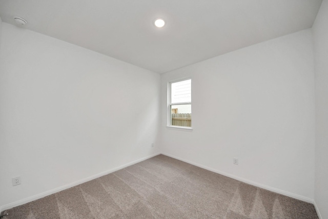24727 Harrow Meadow Dr, Katy, TX 77493 - unfurnished room with light colored carpet and baseboards