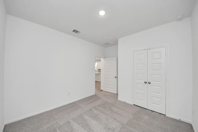 24727 Harrow Meadow Dr, Katy, TX 77493 - unfurnished bedroom featuring carpet floors, baseboards, and visible vents