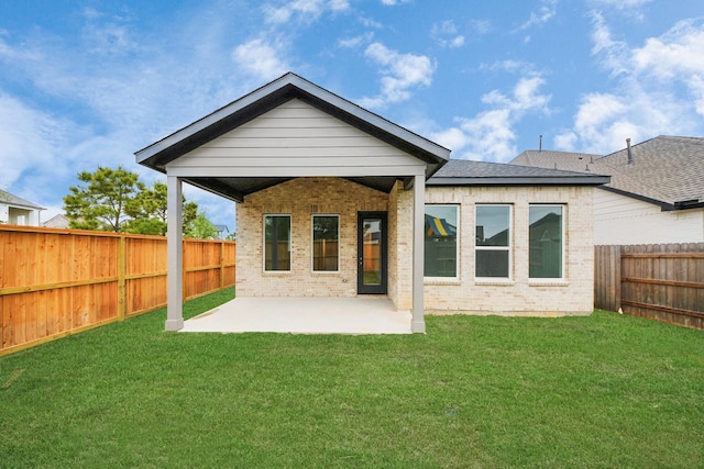 24727 Harrow Meadow Dr, Katy, TX 77493 - back of property featuring a patio area, brick siding, a yard, and a fenced backyard