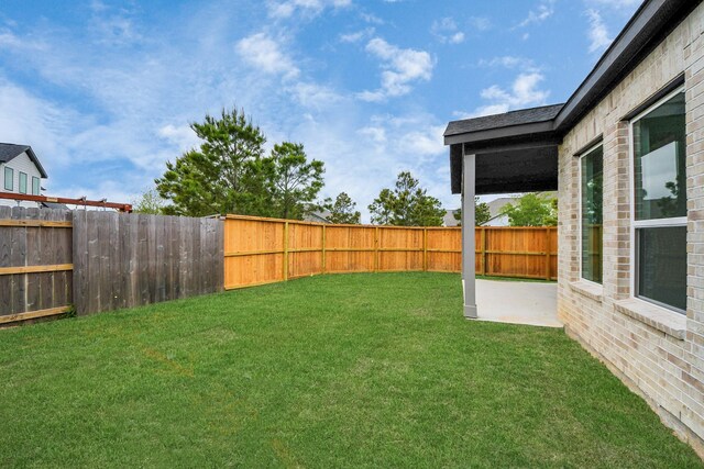 24727 Harrow Meadow Dr, Katy, TX 77493 - view of yard with a fenced backyard and a patio area