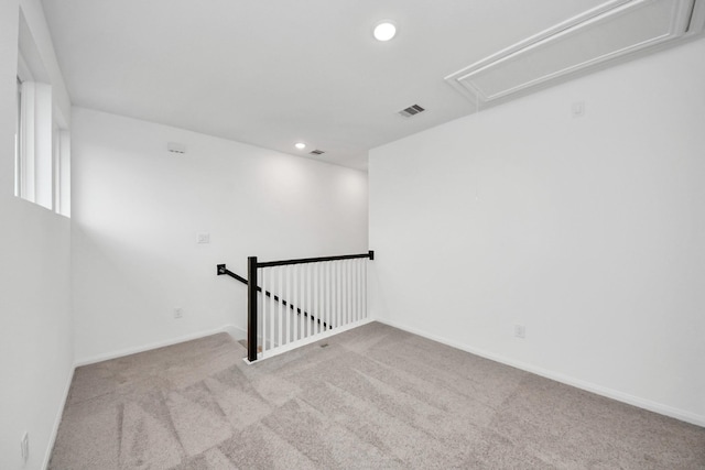 24727 Harrow Meadow Dr, Katy, TX 77493 - carpeted spare room featuring visible vents, baseboards, recessed lighting, and attic access