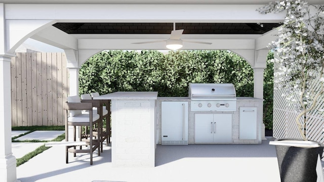 view of patio / terrace featuring ceiling fan, an outdoor kitchen, fence, grilling area, and a bar