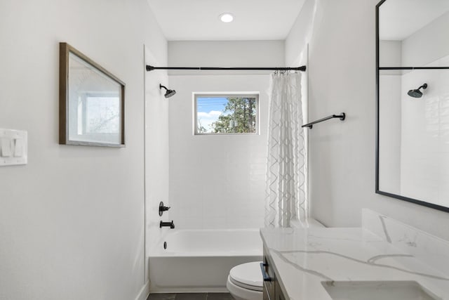 bathroom with vanity, toilet, and shower / bath combo with shower curtain