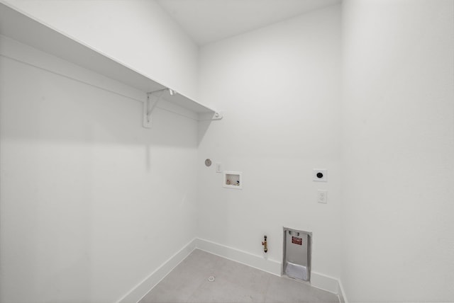 laundry area with washer hookup, hookup for a gas dryer, hookup for an electric dryer, laundry area, and baseboards