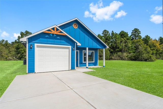 view of front of home featuring concrete driveway, a front lawn, board and batten siding, and an attached garage