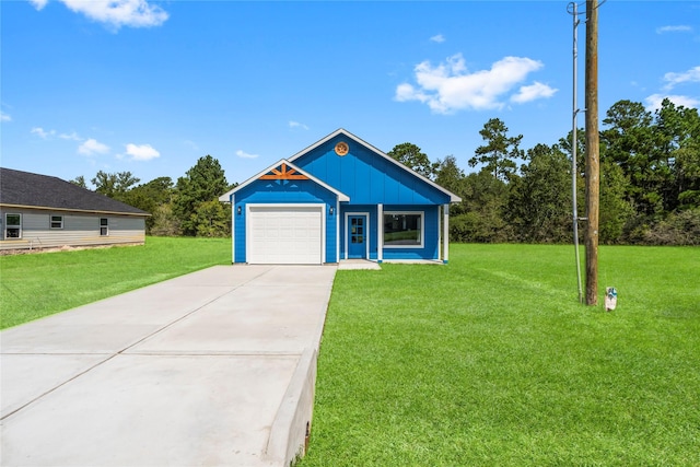 view of front of home featuring a garage, concrete driveway, board and batten siding, and a front yard