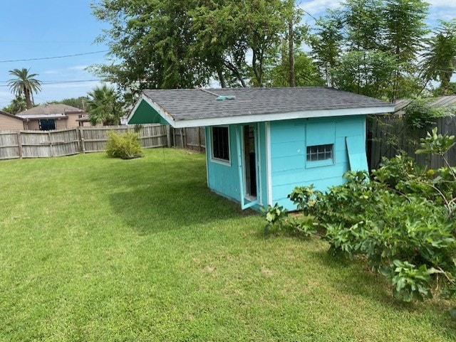 view of shed featuring a fenced backyard