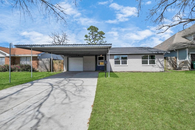 view of front of property featuring a garage, concrete driveway, fence, a front lawn, and a carport