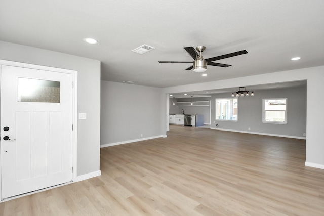 unfurnished living room featuring visible vents, baseboards, ceiling fan, light wood-type flooring, and recessed lighting