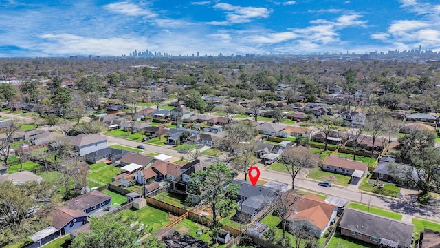 bird's eye view featuring a view of city and a residential view