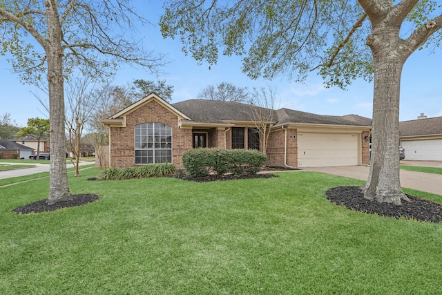 single story home featuring a front lawn, concrete driveway, brick siding, and an attached garage