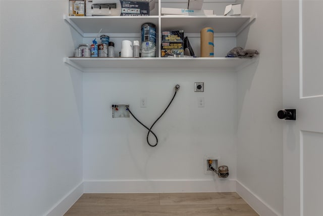 washroom with washer hookup, laundry area, wood finished floors, and electric dryer hookup