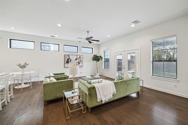 living room with dark wood-style floors, recessed lighting, french doors, and visible vents