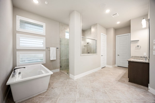 full bath with plenty of natural light, a shower stall, and visible vents