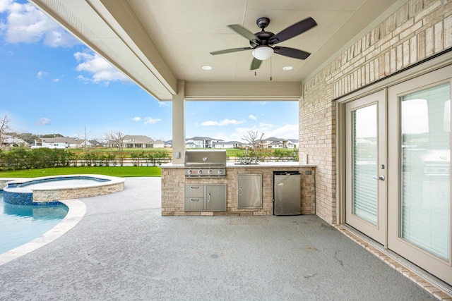 view of patio / terrace featuring french doors, a pool with connected hot tub, area for grilling, and ceiling fan