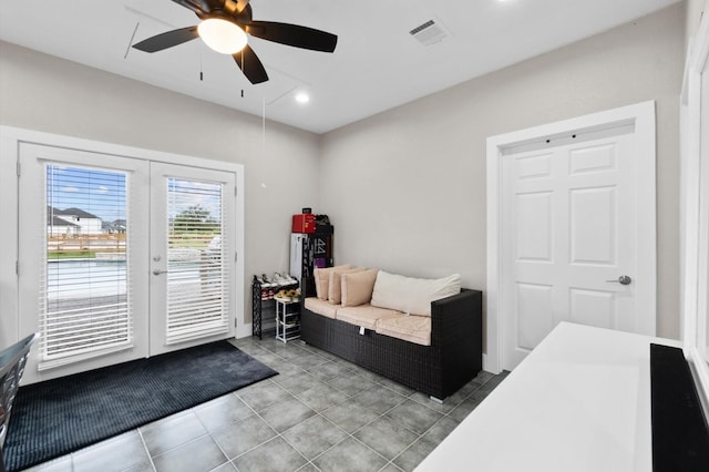 interior space with light tile patterned floors, ceiling fan, recessed lighting, visible vents, and french doors