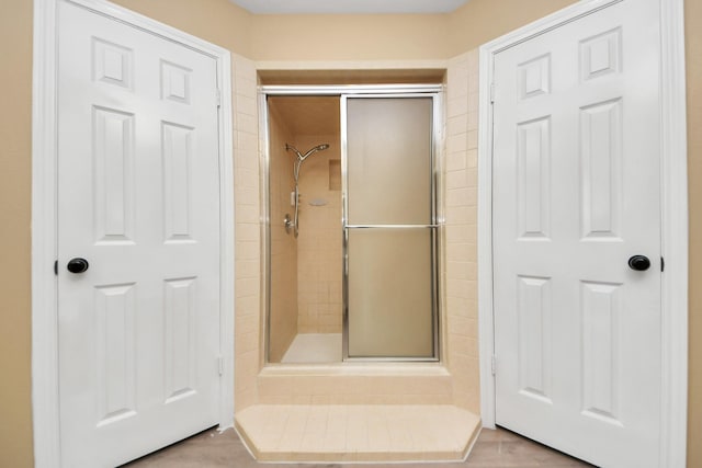 bathroom featuring a stall shower