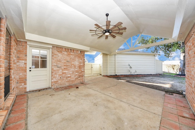 view of patio / terrace featuring ceiling fan and fence