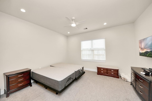 bedroom featuring light carpet, a ceiling fan, visible vents, and recessed lighting