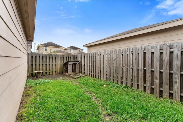 view of yard featuring a fenced backyard