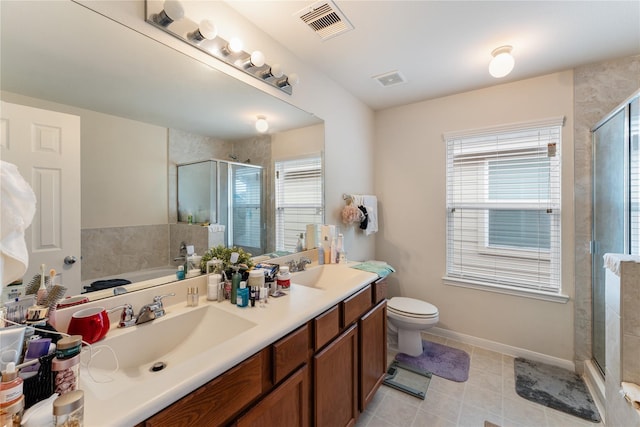 full bath with a shower stall, visible vents, and a sink