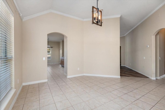 unfurnished room with arched walkways, crown molding, and light tile patterned floors