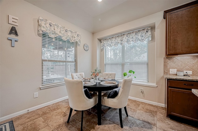 dining space with visible vents and baseboards