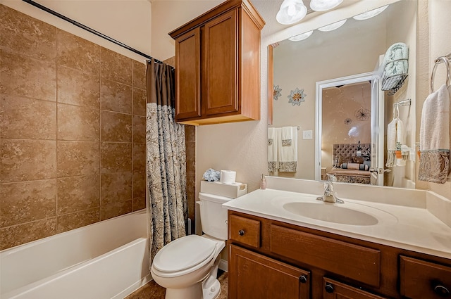 full bathroom featuring toilet, shower / bath combination with curtain, and vanity