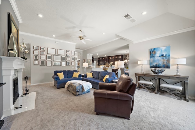 living room featuring ornamental molding, light carpet, a fireplace, and visible vents