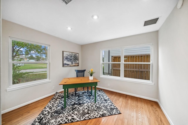 office area featuring recessed lighting, visible vents, baseboards, and wood finished floors